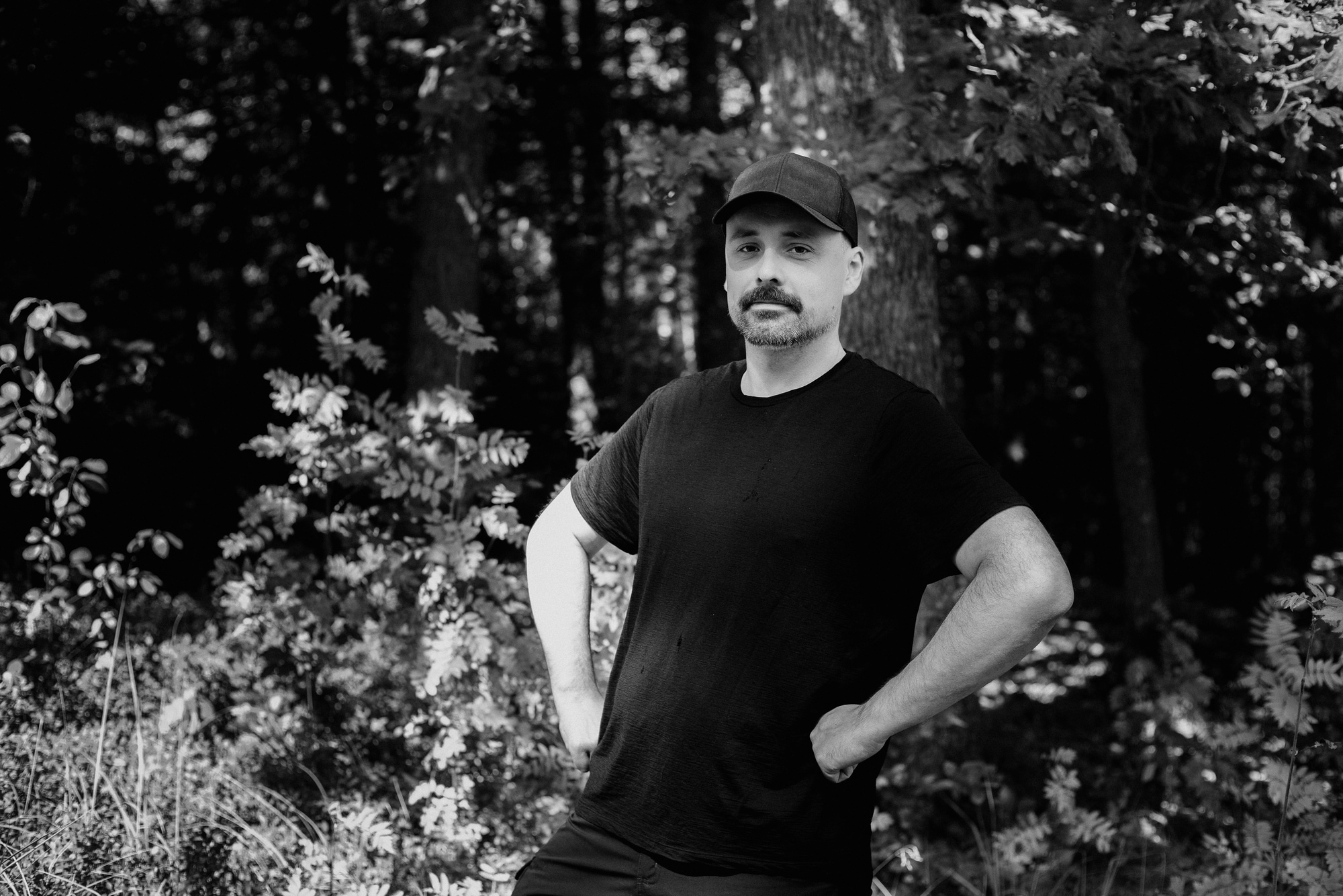 Rafael Fyen standing in the woods